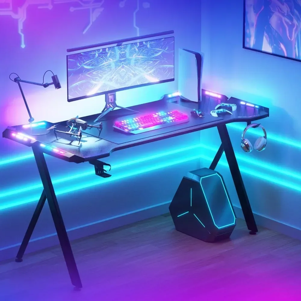 

Gaming desk with LED lights, RGB gaming computer desk with carbon fiber surface, PC workstation with cup holder and headset hook