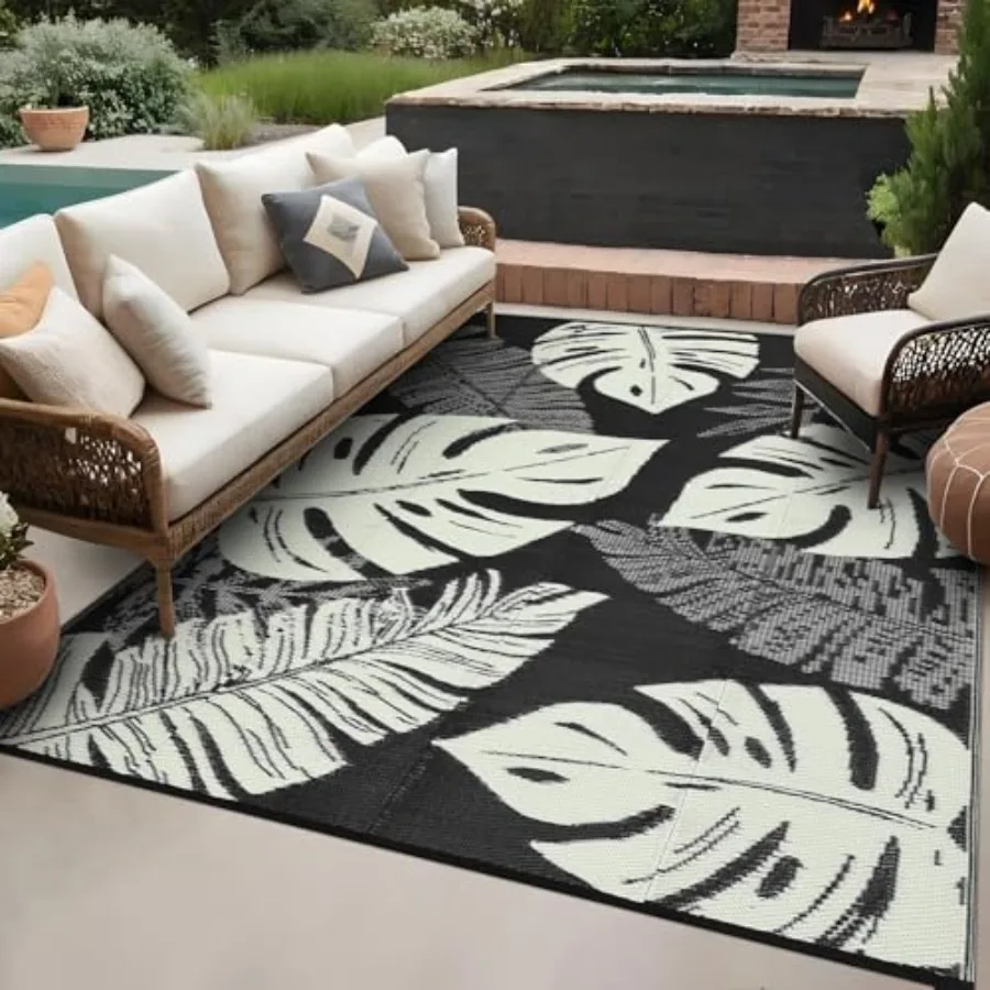 

Outdoor patio rug waterproof foldable plastic straw carpet with modern leaf print, black/beige reversible mat for porch, picnic