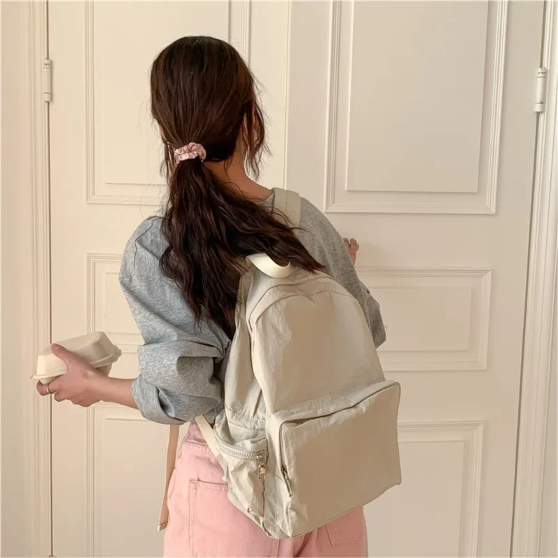 Zaino per studenti universitari di grande capacità donna 2024 borsa da scuola per zaino in Nylon coreano di nuova moda Versatile zaini Casual solidi