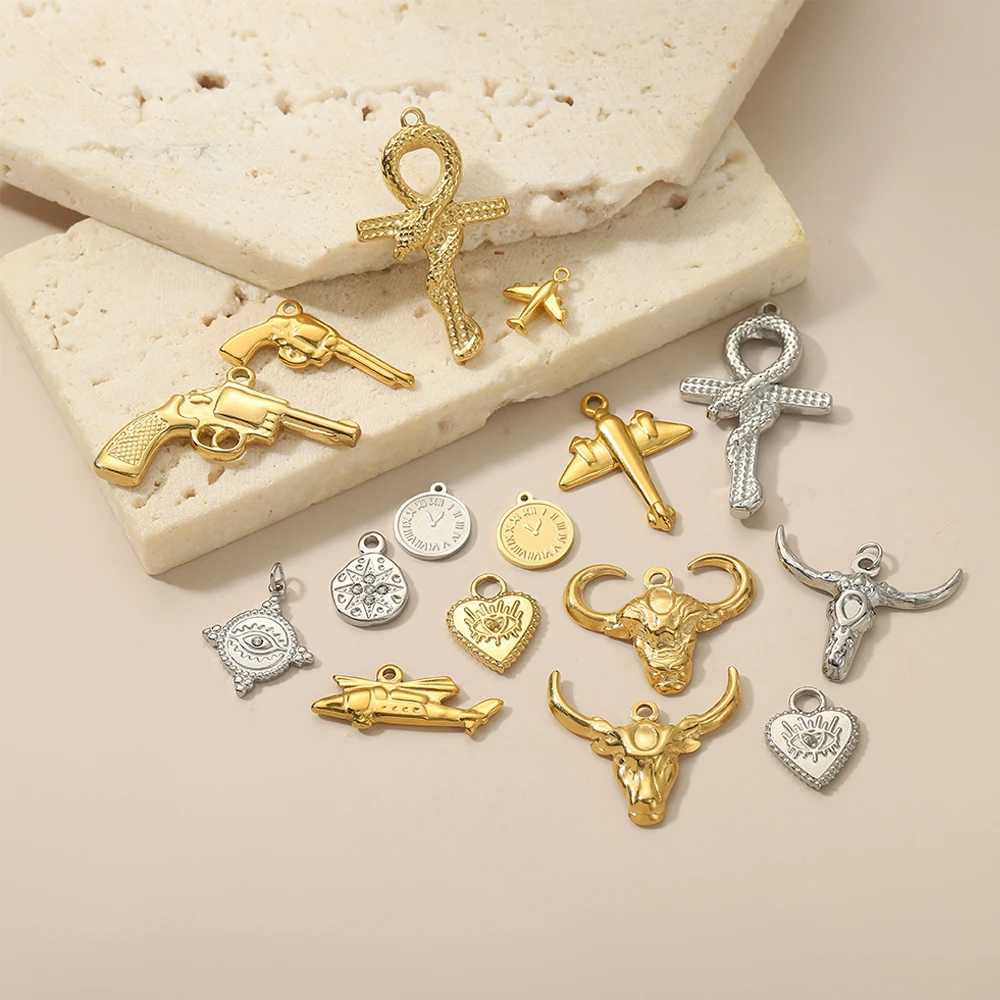 3PCS/LOT CARLIDANA Gold Plated Stainless Steel Charms, Bull Head Cattle Gun Airplane Heart Pendants for Men Women Jewelry Making