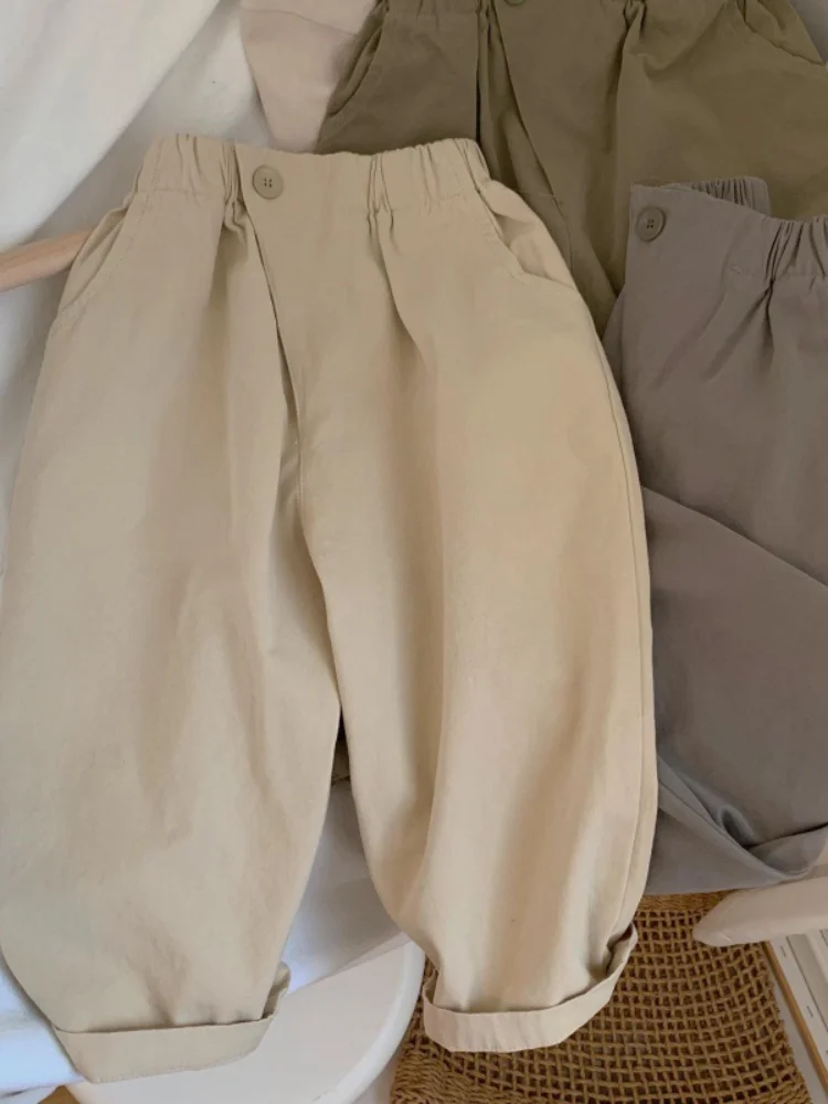 Pantalones informales con botones inclinados para niños, color Beige, primavera y otoño, nuevo conjunto de ropa para niños y niñas, a la moda y elegante