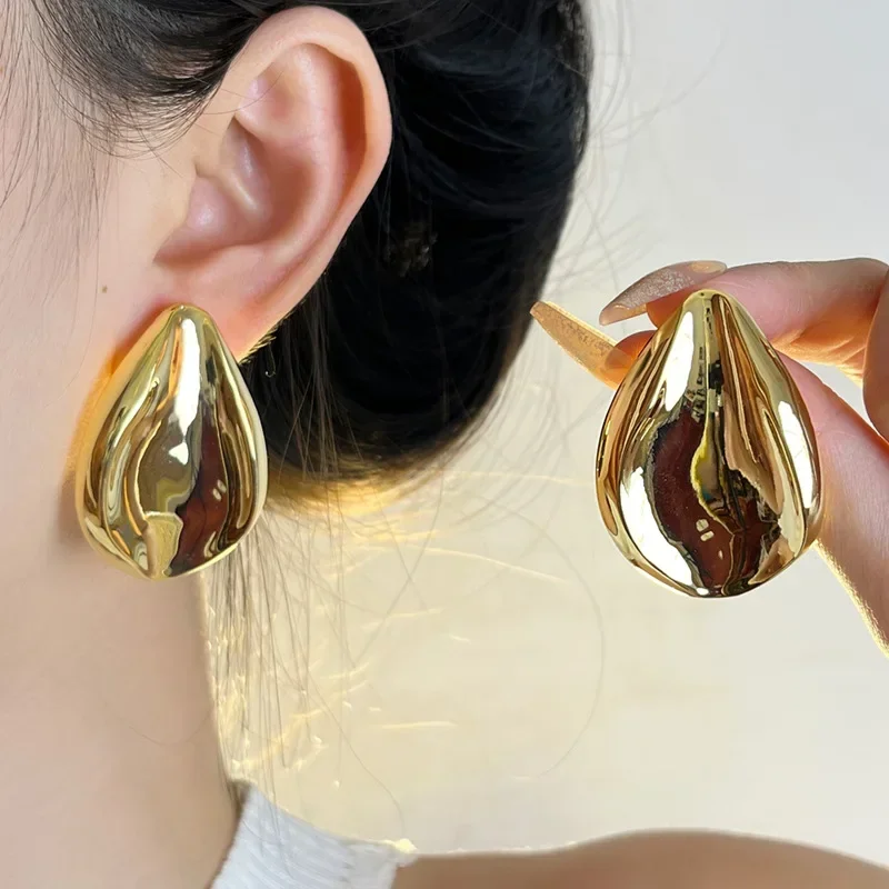 Cold wind smooth surface metal water droplets unique new irregular explosion high sense exaggerated earrings