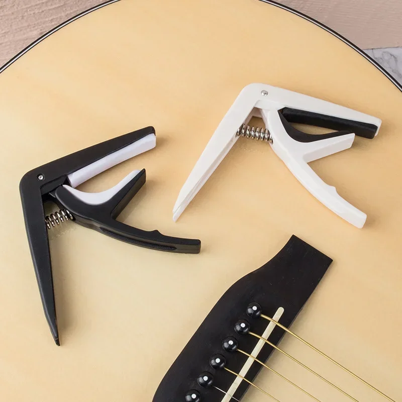 Capo de guitarra Universal ABS + Metal, llave de abrazadera de cambio rápido, accesorios de piezas de guitarra eléctrica clásica acústica, 1 unidad