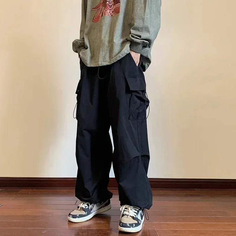 

Men Solid Cargo Pants 2023 Harajuku Elastic Waist Side Pocket Tracksuit Pants Male Casual Hip Hop Drawstring Baggy Long Trousers