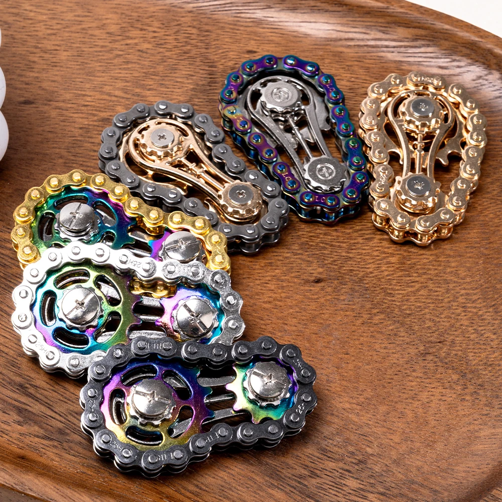 1 لعبة دوارة متململة على شكل سلسلة دراجات معدنية ملونة، فعالة في تخفيف التوتر