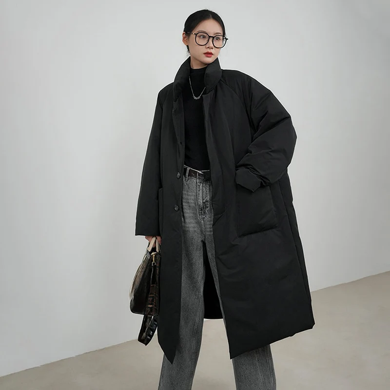 2025年冬 ロング丈 中綿コート レディース トレンド オーバーサイズ ゆったり スタンドカラー パーカー 女性らしい気質 ボタン付き 大きめポケット ジャケット