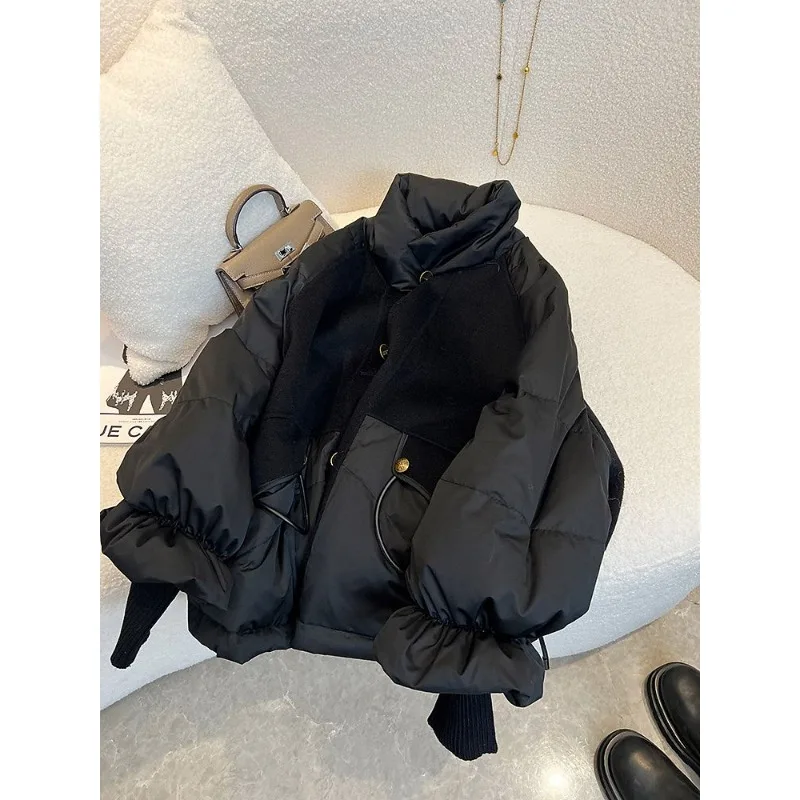 婦人服黒厚手スプライシング黒金ダウン綿服婦人冬薄手高級版見栄えの良いコート