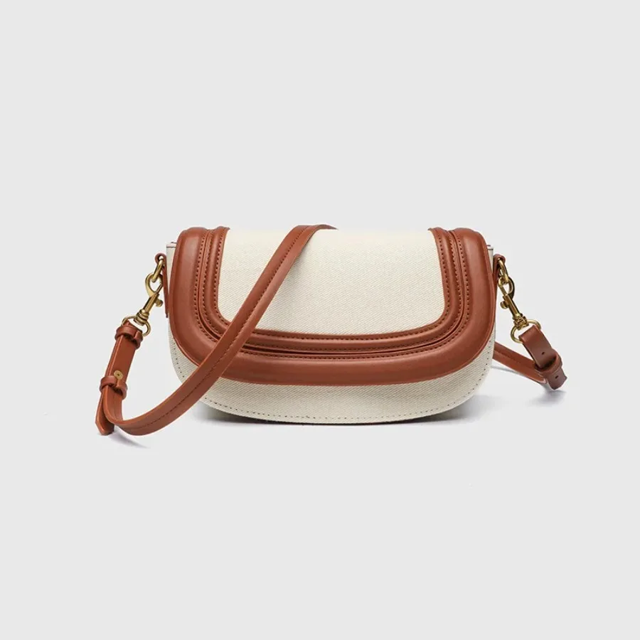 

Spring and summer new texture wide shoulder strap diagonal cross bag simple fashion armpit saddle female bag tide canvas bags