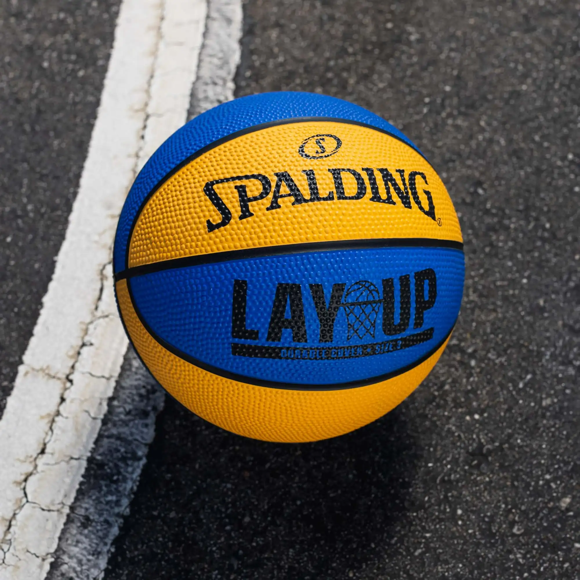 

Spalding Layup Mini Baloncesto de Goma para Exteriores - Azul/naranja