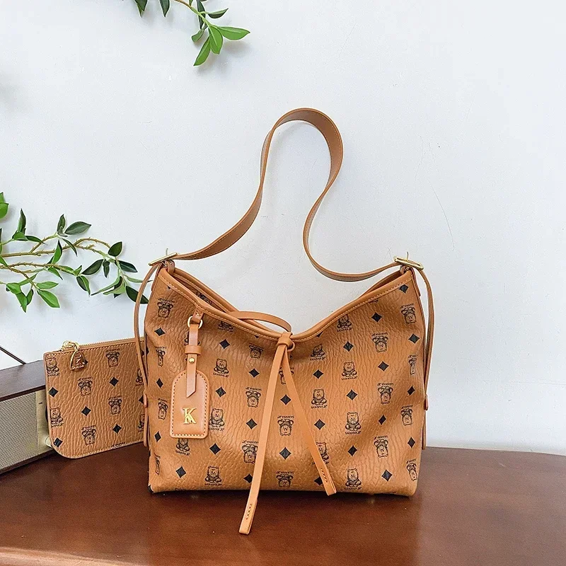 

Stylish Leather Clutch With Wristlet Strap - Minimalist Evening Bag Featuring Gold Letter Logo And Vintage Details