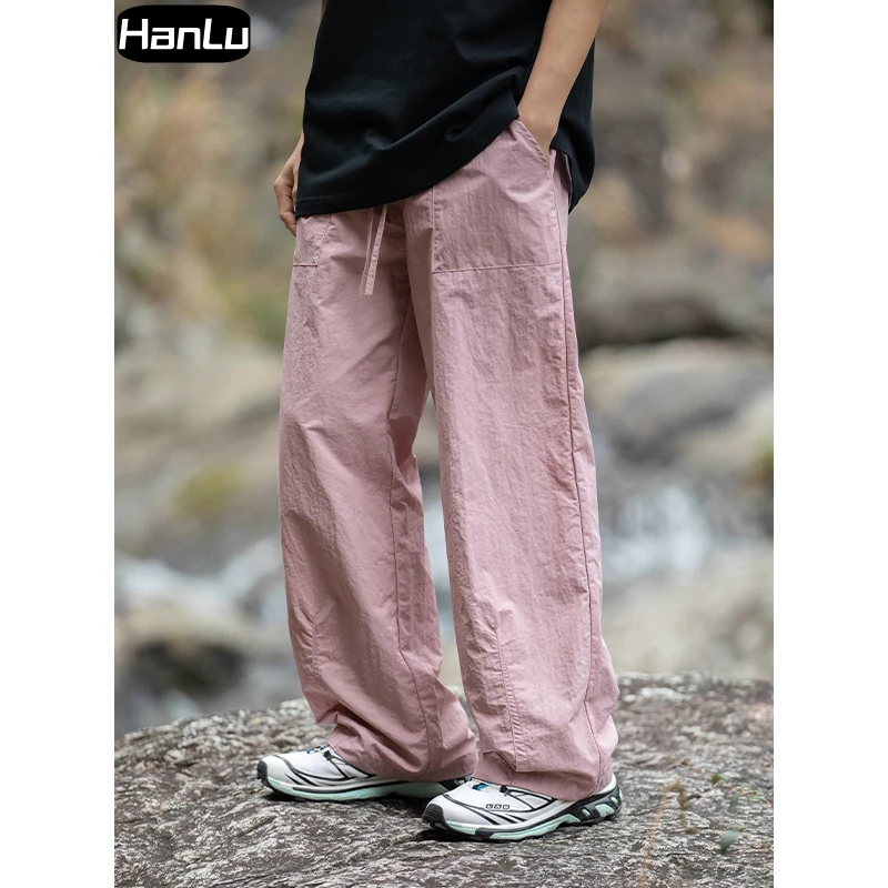 Pantaloni Casual da uomo primavera/estate nuovo tubo dritto pantaloni da lavoro moda Hip Hop pieghettati sottili da donna