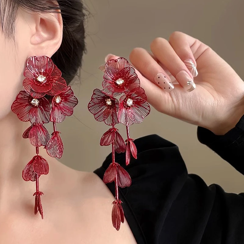

Vintage exaggerated red flower fringed earrings New Chinese hollow heavy industry earrings