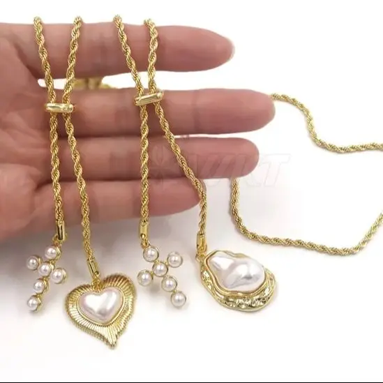 

Изысканное ожерелье WT-JFN52 с подвесками в виде креста, сердца и цветка из латуни и искусственного жемчуга – прекрасный аксессуар для сестры.