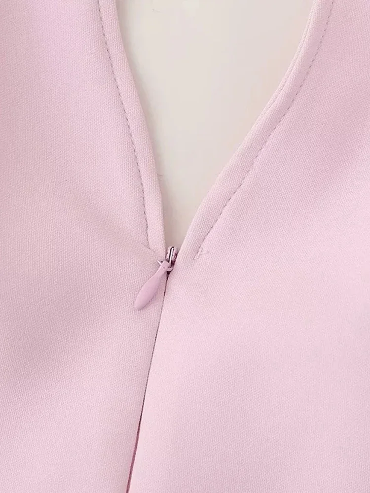 Conjunto de pantalones cortos rosas a la moda para mujer, tops sexys sin mangas con cuello en V, falda ajustada a la cadera para mujer, traje nuevo para primavera y verano 2024