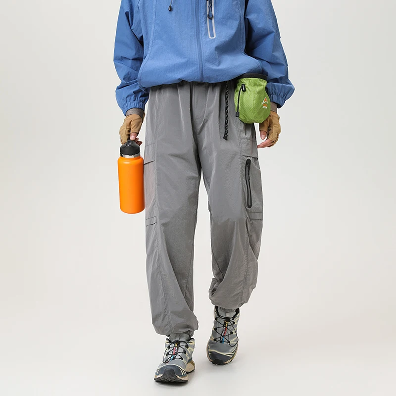 

Men Autumn Spring Casual Pants Fashion Loose Mens Outdoor Sports Waterproof Windproof Pockets Sweatpants Oversize Male Trousers