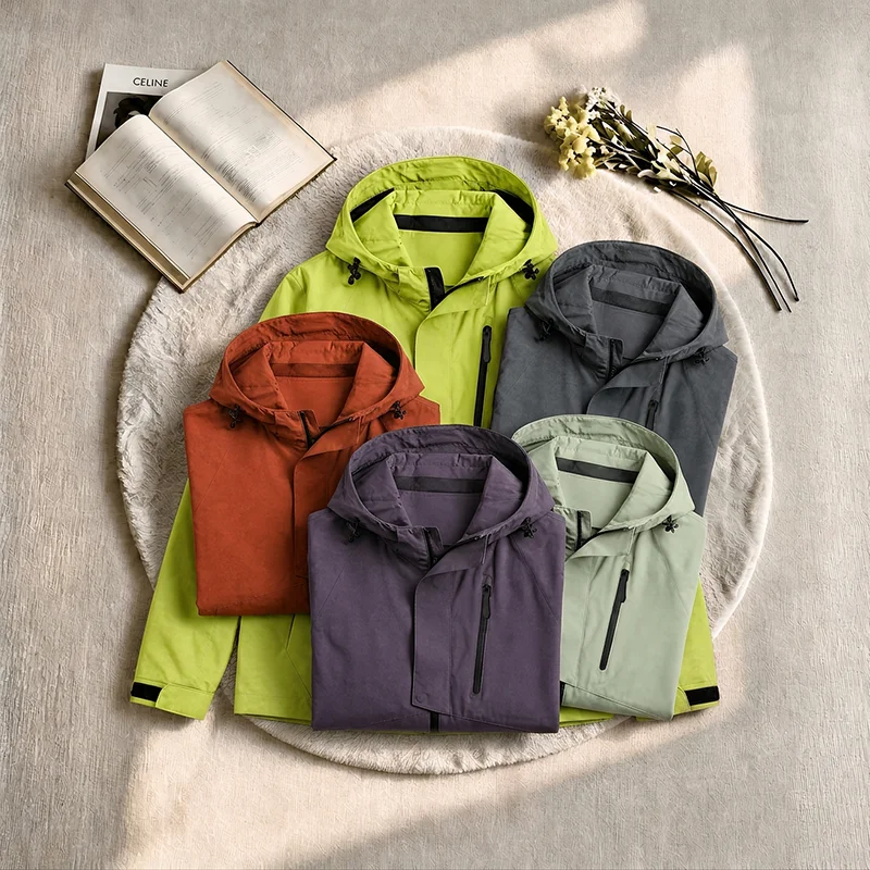 High-Quality Fashion Magnetic Buckle Single-Layer Level 4 Waterproof 75D Double Weave Hooded Breathable Jacket