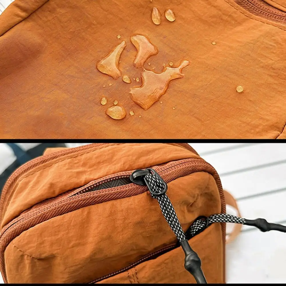 حقيبة كتف نايلون بلون سادة خفيفة الوزن مقاومة للماء حقيبة كروس رياضية على الطراز الكوري سعة كبيرة حقيبة صدر خارجية للرجال