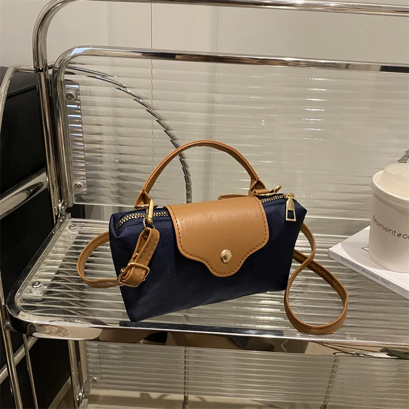 Bolso cruzado Retro de nicho recién lanzado con un diseño Simple, adecuado para llevar y accesorios versátiles de moda