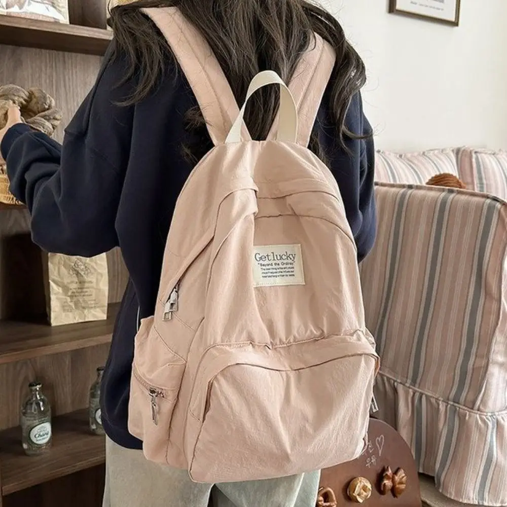 

Simple Lightweight Travel Backpack Korean Style Nylon Solid Color Backpack Waterproof Large Capacity Student Schoolbag Outdoor