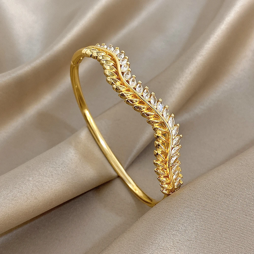 

Elegant Zircon Leaves Gold Plated Open Bracelet for Women Retro Irregular Wave Spring Open Bangle Party Wedding Jewelry Gift