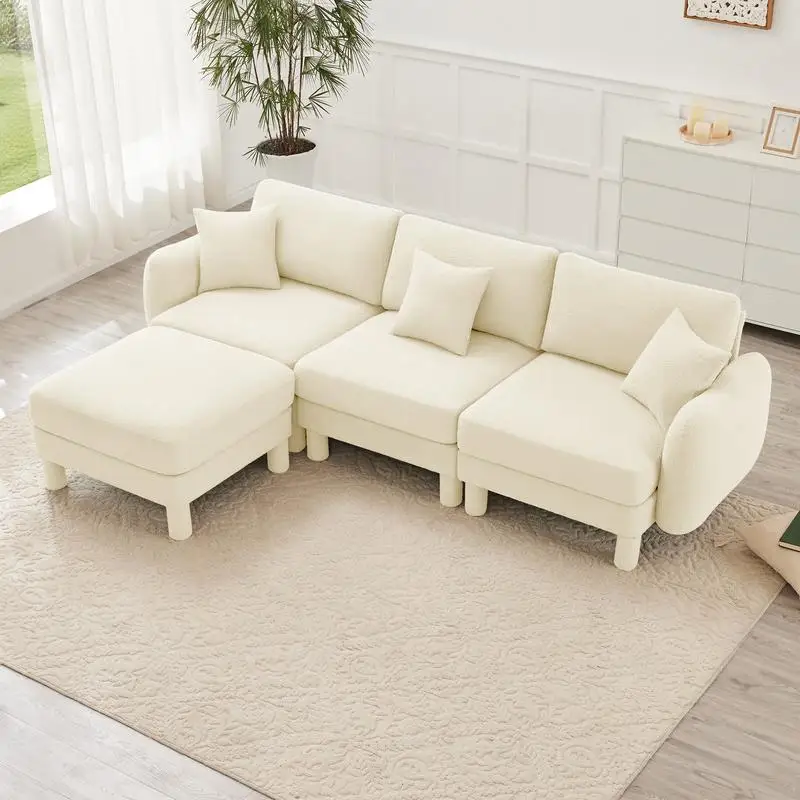 أريكة مقطعية على شكل حرف L قابلة للتحويل باللون البيج مع مساند للذراعين على شكل صدفة، وعثماني قابل للإزالة وأرجل أسطوانية ملفوفة