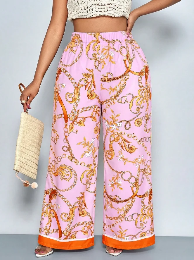 European and American style plus size pink metal chain print wide-leg pants; elastic high waist orange trim drape vacation style