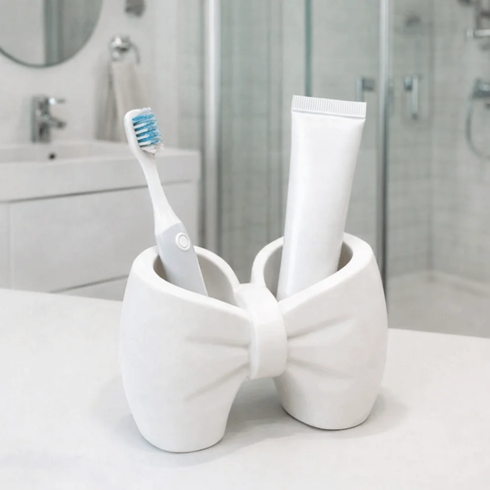 

Пластиковый держатель для зубных щеток в форме банта, легкий, декоративный, для зубных щеток и пасты, милый держатель для ручек для ванной комнаты