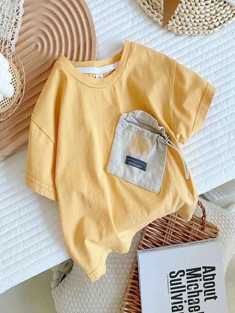 Camiseta Infantil Masculina de Manga Curta Cor Pura Verão Desenho Animado Roupa Infantil 2026 Novo Estilo Blusa de Meia Manga Algodão Camiseta Infanti