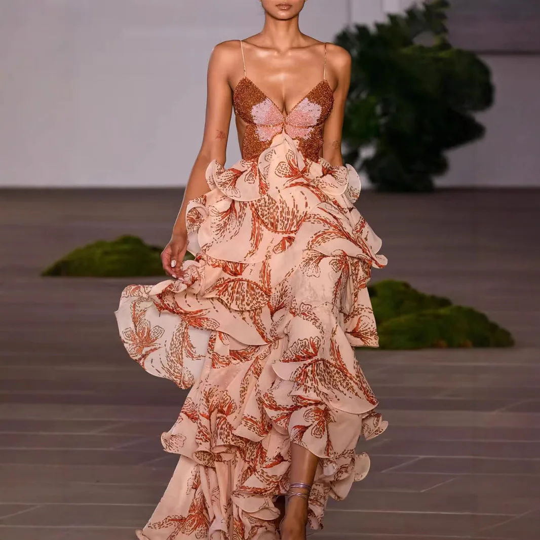 シックな蝶プリントフリルプリーツドレス女性セクシーな V ネックバックレスタイアップロングドレス夏ノースリーブ中空アウトボヘミアンティアード