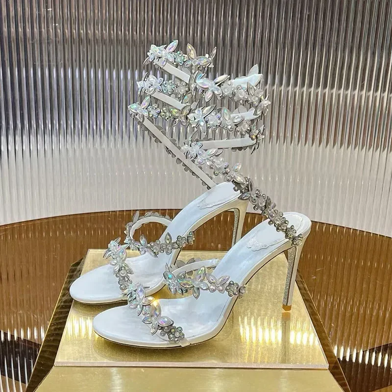 المرأة رقيقة عالية الكعب حزام مطاط صنادل طراز جلاديتور بلينغ حجر الراين زهرة ديكور Sandalias الصيف فستان وصيفة الشرف الأحذية