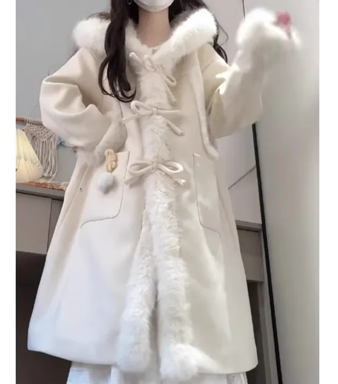 معطف نسائي موضة حلوة متعدد الاستخدامات بفيونكة لتقليل العمر بلون واحد لشتاء 2025 معاطف صوفية كورية فضفاضة طويلة لطيفة بقلنسوة #3