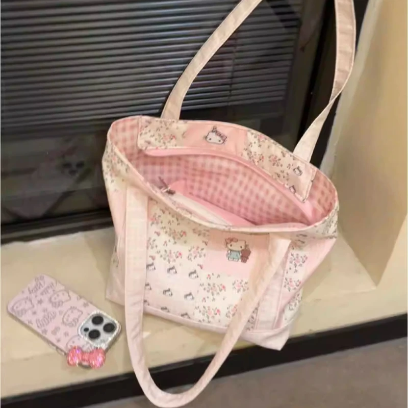 

Модная женская сумка Sanrio с цветочным принтом и мультяшным рисунком Hello Kitty, повседневная портативная холщовая сумка большой вместимости для хранения вещей
