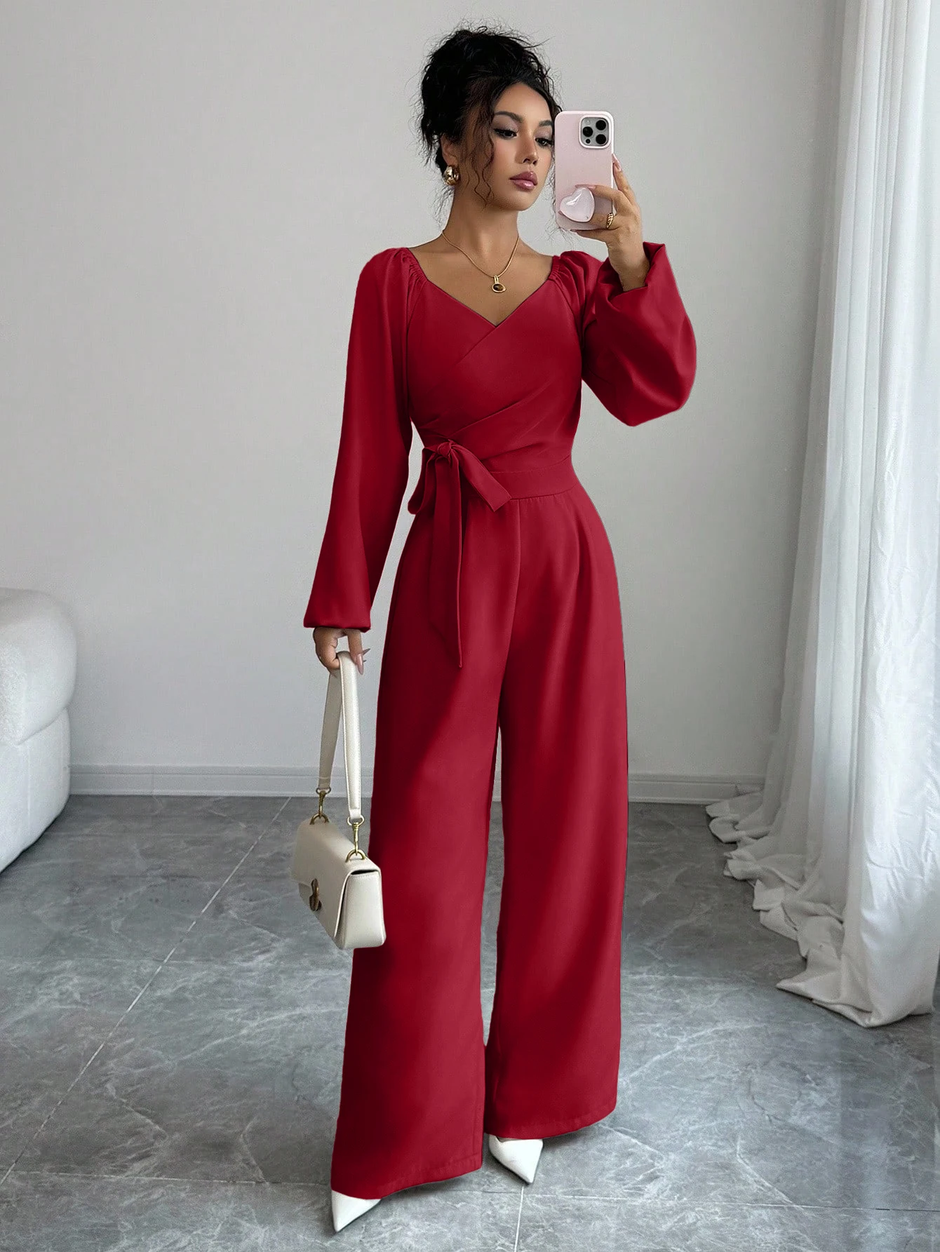 

Women's 2025 Spring and Autumn elegant temperament solid color long sleeved V-neck waist wide leg jumpsuit