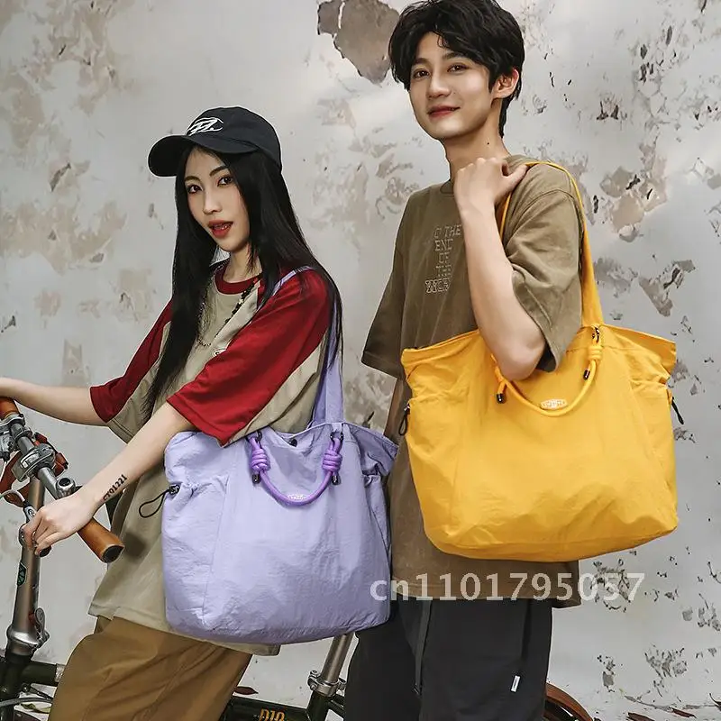 

Unisex Large Capacity Tote Bag 2025 New Style Lightweight Commuter Shoulder Crossbody Bag Fashionable Casual Travel Nylon Bag