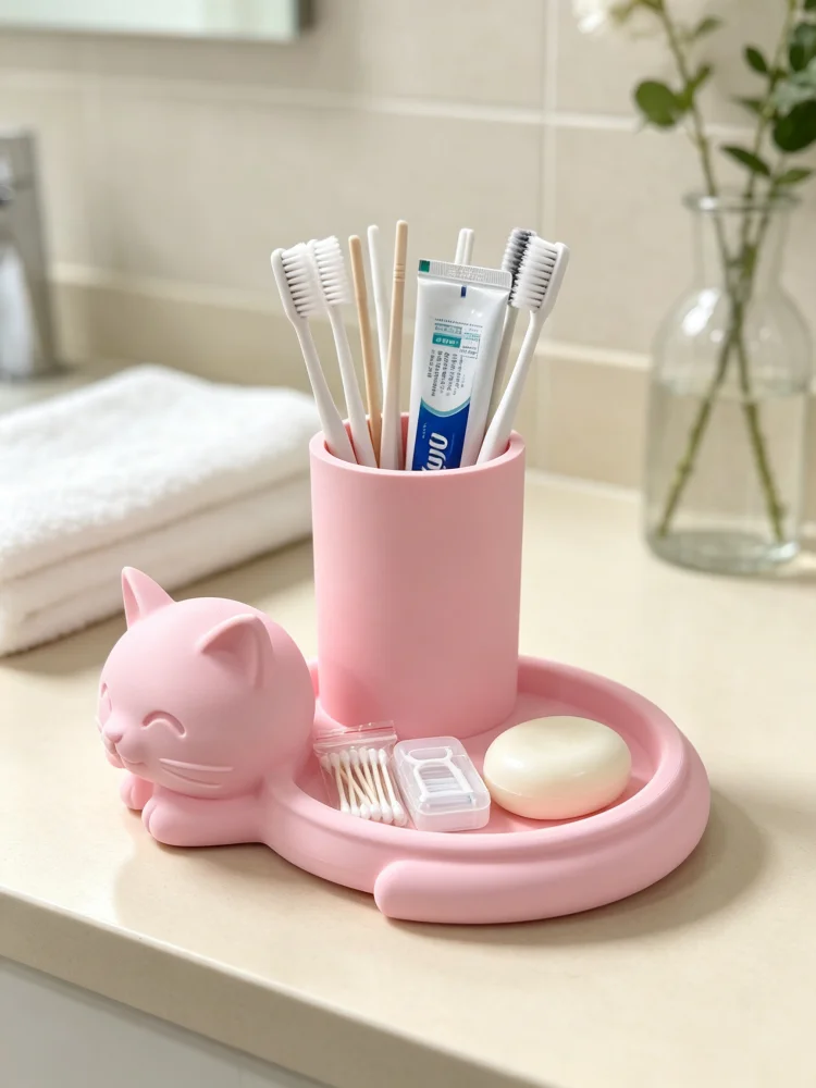 3D Printed One-Piece Pink Cat Toothbrush Holder with Tray Storage Rack. Matte Texture, Fine Workmanship, Smooth Edges Without Burrs. Three-Dimensional Cat Design with Vivid Details and Full-Bodied Appearance. Two-In-One Design with Vertical Toothbrush Holder and Side Tray. Organized Storage for Bathroom Toiletries. Suitable for Bathroom Countertops and Vanity Tables. Exquisitely Crafted High-Aesthetic Bathroom Storage Item