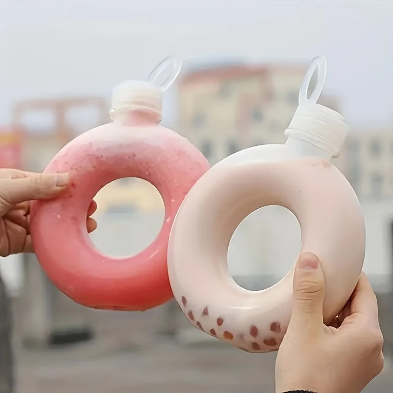 1 Stück Ozzy Donut-förmiger Wasserbecher, tragbare, auslaufsichere Milchtee-Flasche, geeignet für Schule, Zuhause und Outdoor-Sport