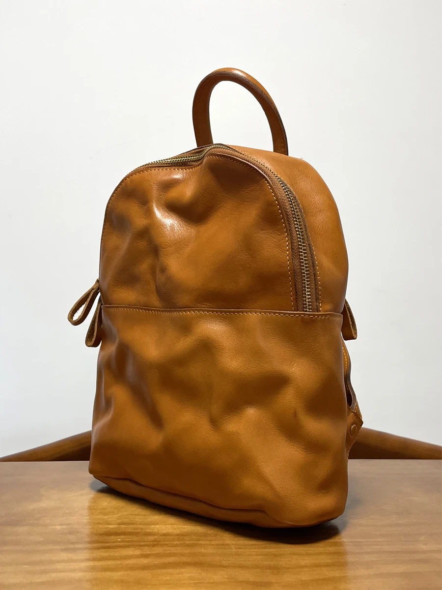 

Simple vintage vegetable tanned cowhide women's backpack casual outdoor travel party handmade genuine leather ladies bagpack