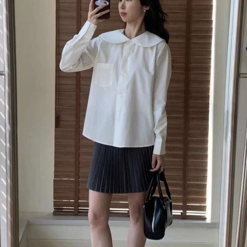 เสื้อเชิ้ตแขนยาวทรงเข้ารูป คอทรงกลม สีพื้น แต่งกระเป๋าเสื้อ แฟชั่นผู้หญิง ฤดูใบไม้ผลิ/ฤดูร้อน 2025