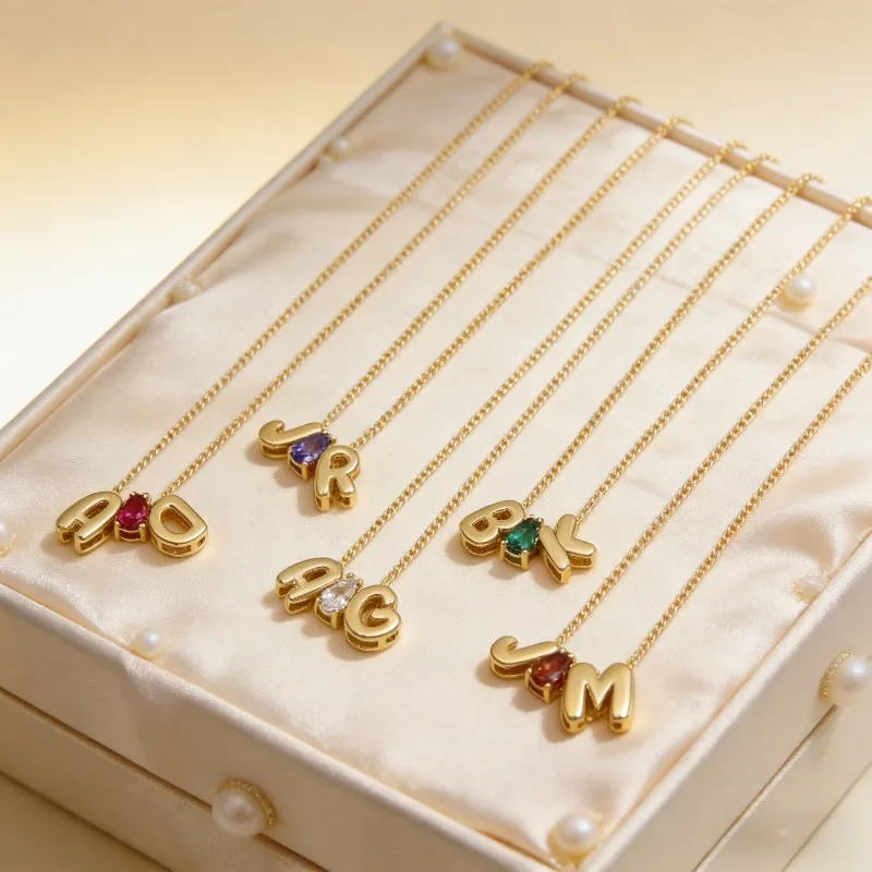 

Customized 18k Brass Teardrop Shaped December Birthstone Paired with 26 English Letters DIY Combination Name Pendant Necklace