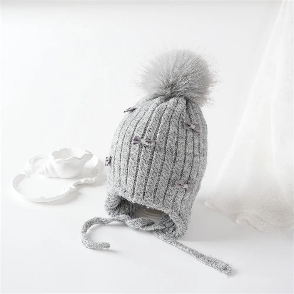 

Cute Pompom Bows Children Winter Hat Thicken Fleece-lined Girl Cap Ears Protection Kids Bonnet Hat Autumn