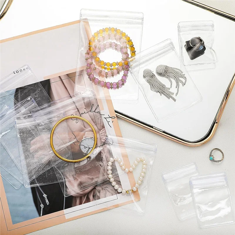 

A43F-200 шт. полоски против тускнения с наборами пластиковых сумок для ювелирных изделий, 100 сумок для хранения и 100 полосок против тускнения