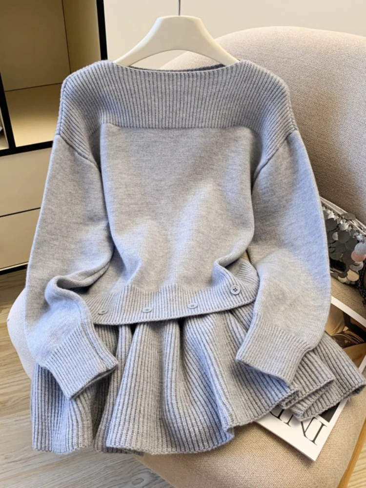 Elegant two-piece set spring and autumn women's loose fitting sweater+detachable short skirt fart curtain design sense set