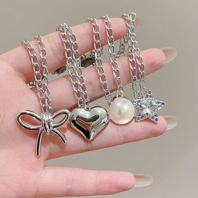 4/8 Stück dekorative Clips für den Saum von Kleidung, Herz-Schleifen-Design, geeignet zum Befestigen von Knopfkettenclips an Hemden, Hosen und Manschetten – Detail 3