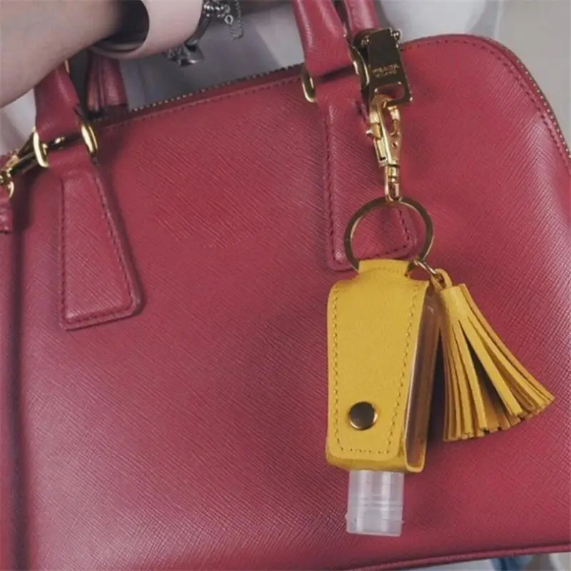 

Hand Sanitizer Bottle Leather Keychain Leakproof Travel Squeeze Container Bottle