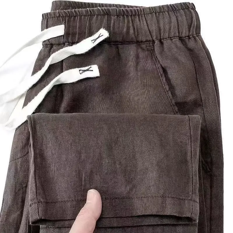 กางเกงขายาวผ้าฝ้ายลินินสำหรับผู้ชาย ใส่สบาย ระบายอากาศได้ดี เหมาะสำหรับใส่ในชีวิตประจำวัน สไตล์ลำลอง ทรงหลวม ขาตรง เหมาะสำหรับวัยรุ่น