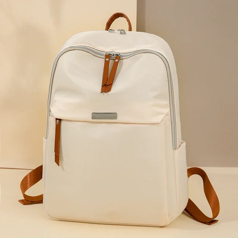 Solid Color Nylon Soft Handle Zipper Backpack 2025 Hot Sale Air Cushion Strap Casual School Bags Large Capacity Designer Handbag