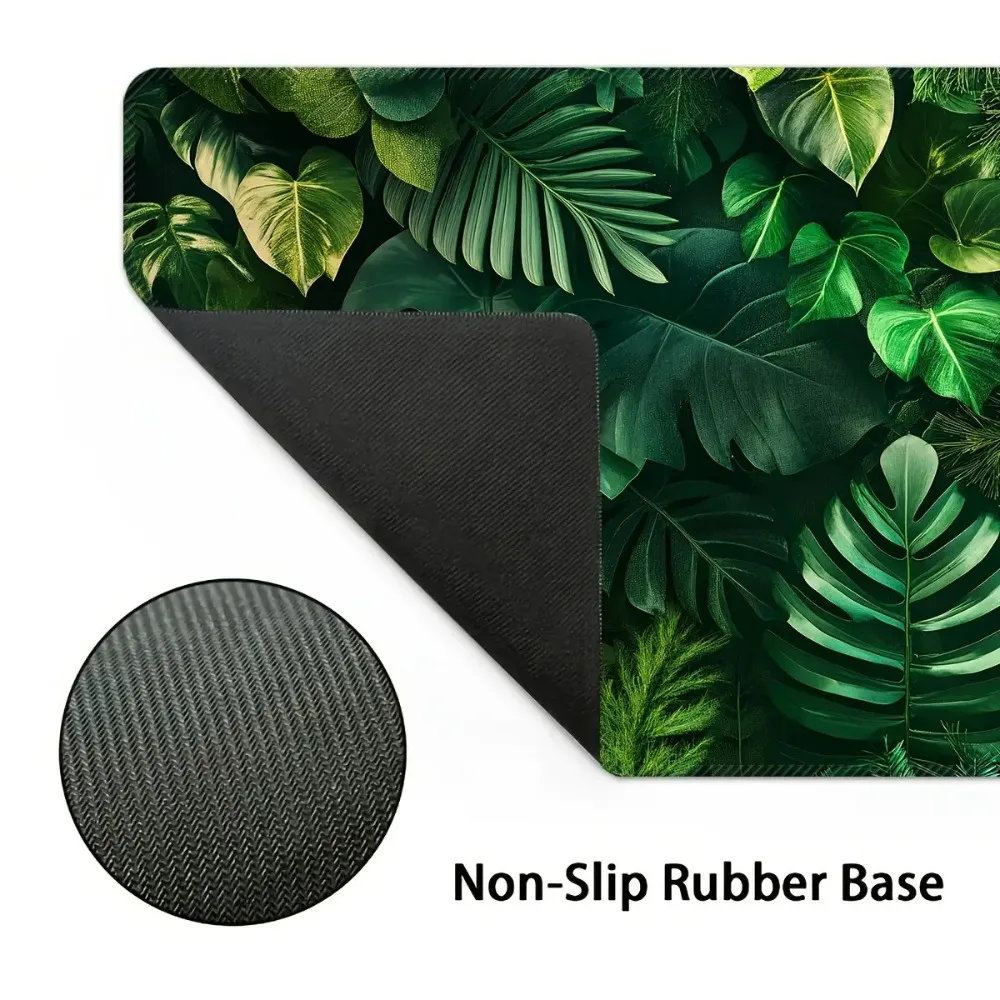Large gaming mouse pad, featuring a tropical rainforest pattern design, equipped with anti-slip rubber lining, washable surface
