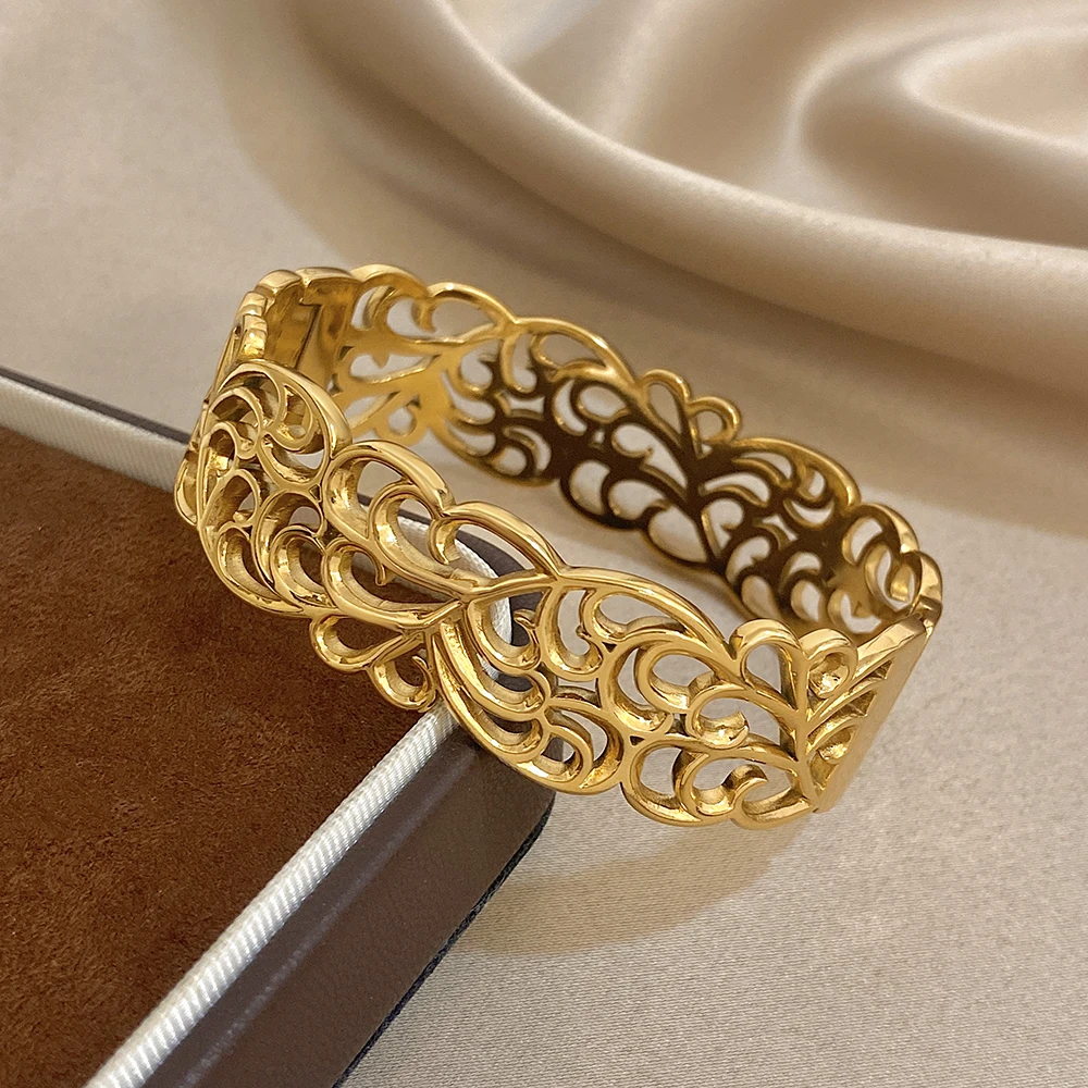 Freetry خمر الفولاذ المقاوم للصدأ الكفة واسعة سوار للنساء العصرية الذهب اللون الجوف خارج زهرة الإسورة هدايا مجوهرات مقاوم للماء