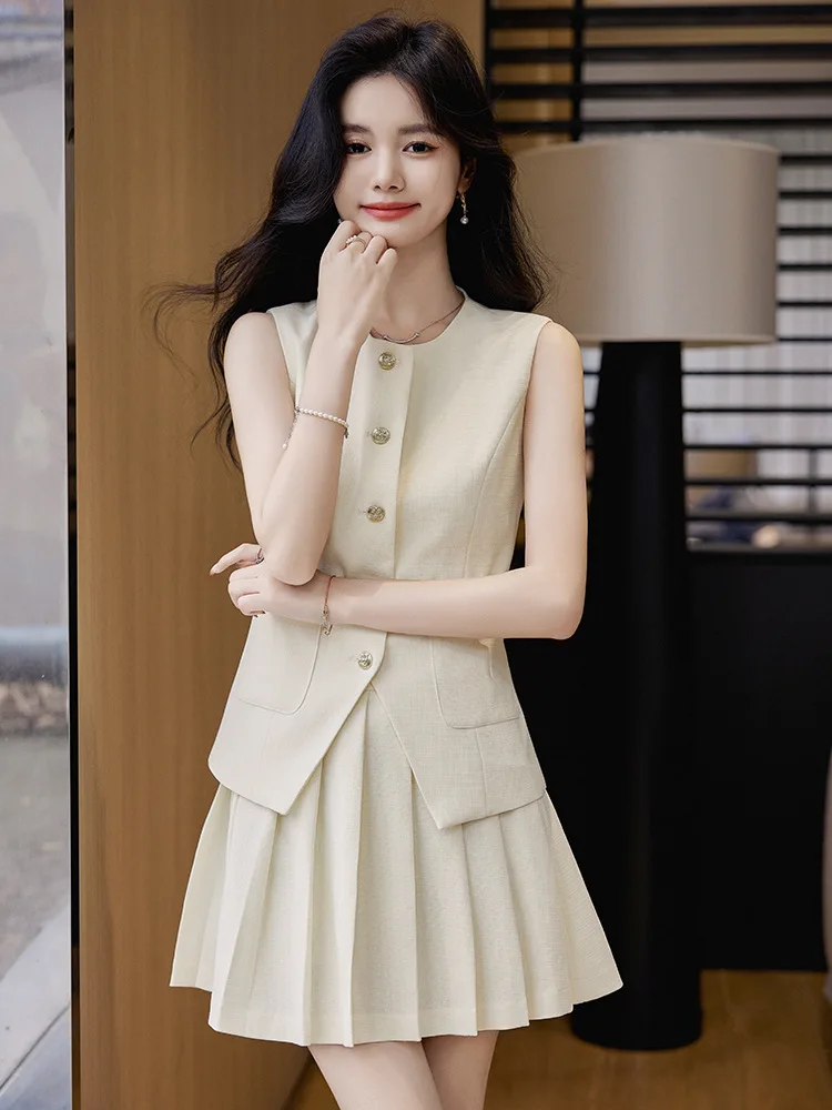 

Модный женский летний комплект без рукавов с элегантным, изысканным и шикарным стилем, включающий плиссированную юбку и повседневную кофту.