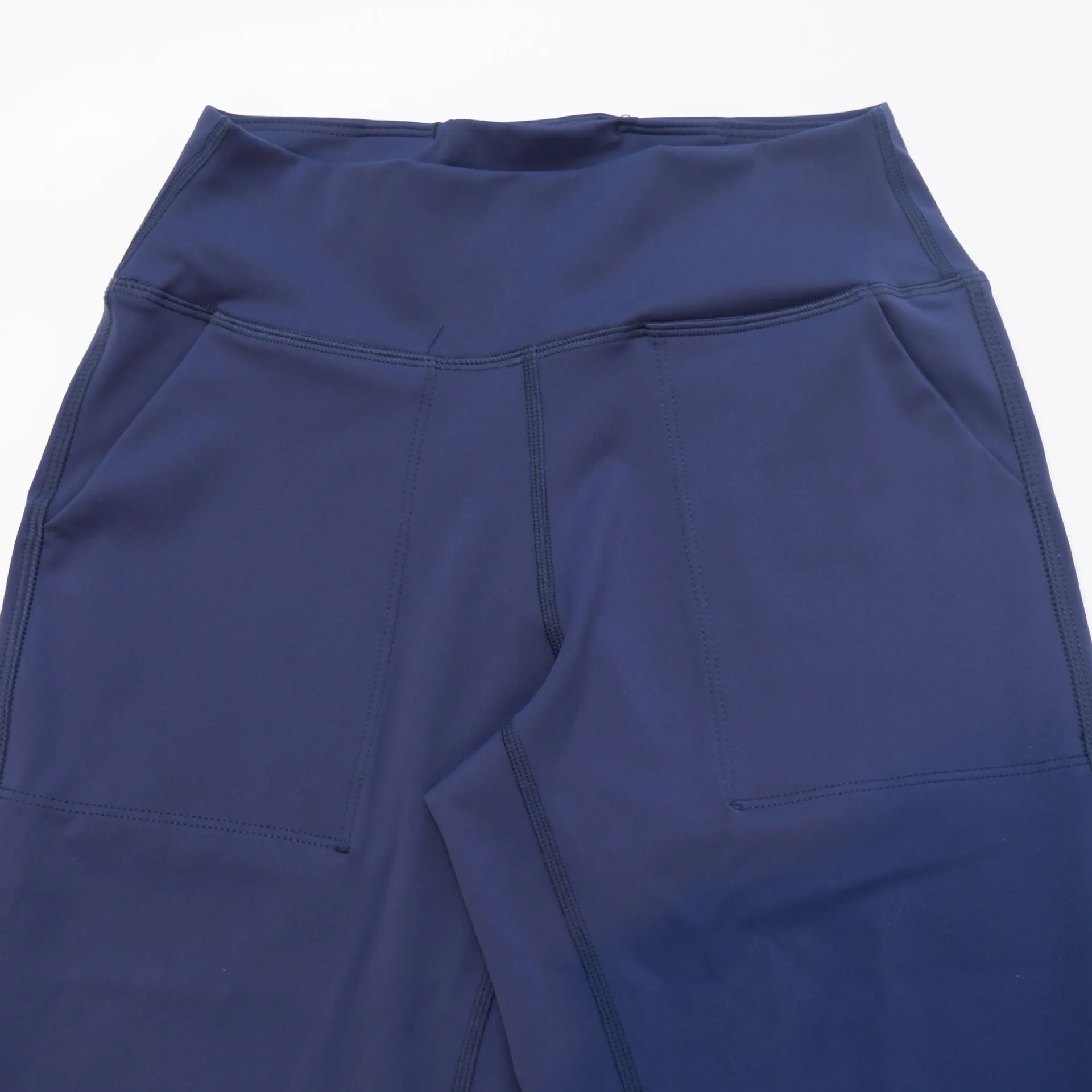 بنطلون يوغا طويل مرن عالي الخصر للنساء مع جيوب خارجية وأصفاد مريحة للكاحل وخصر مرن لصالة الألعاب الرياضية واليوجا